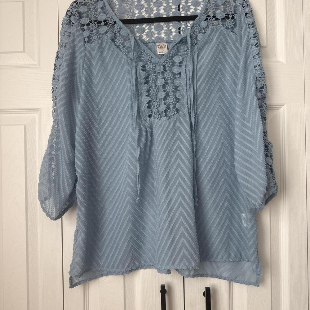 Bila Blue lace blouse with chevron pattern and lace trim